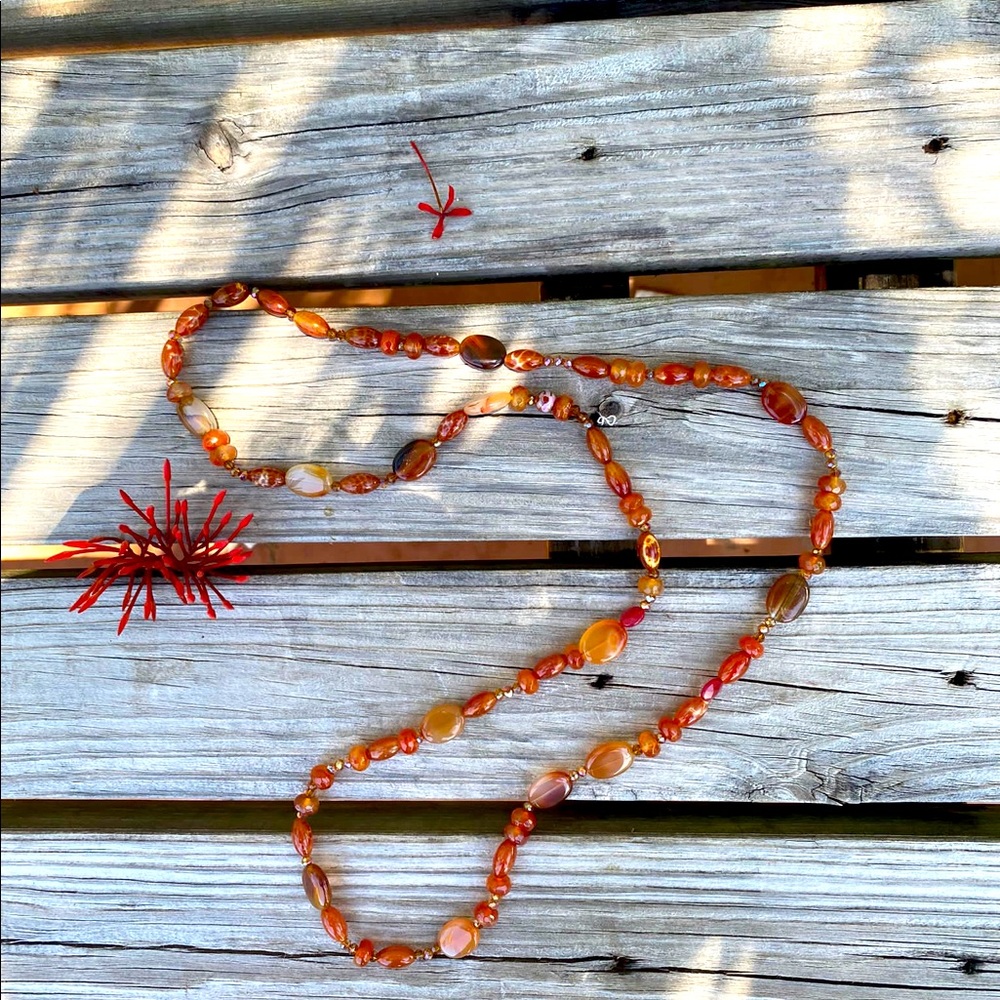 Lovely hand made long necklace in amber color